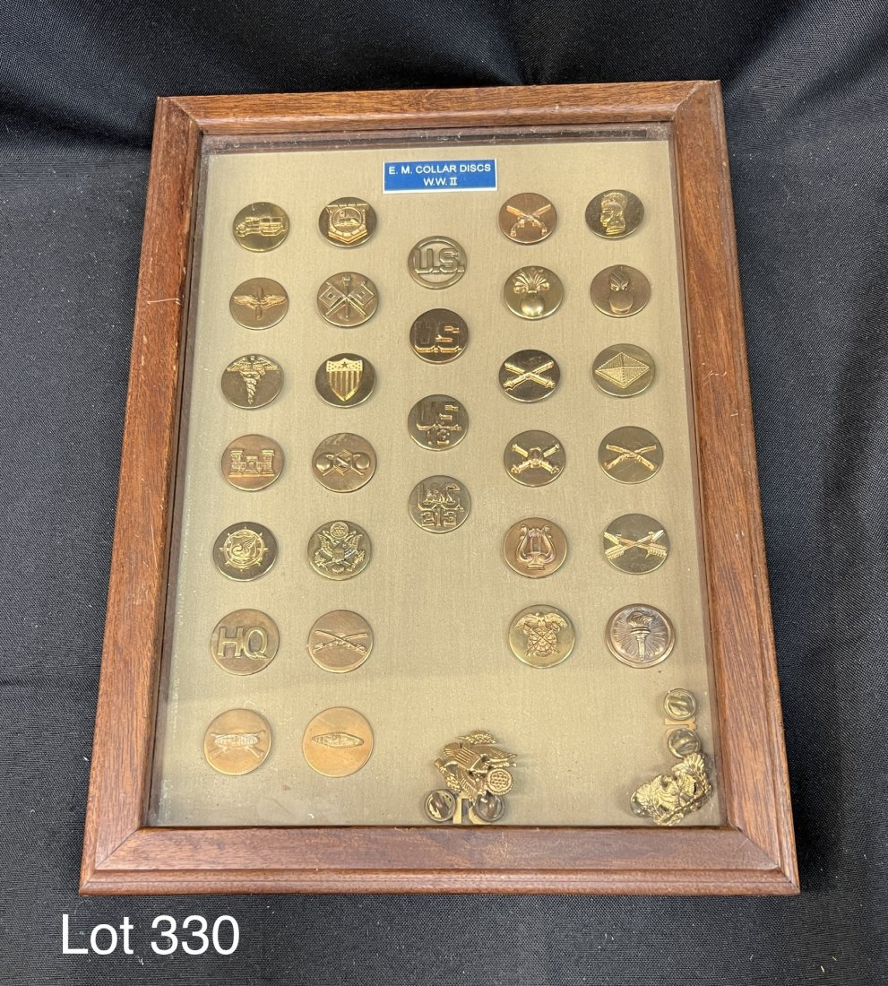 Collection of WWII Collar Discs: Lot of 33 WWII collar disc pins. Presented in a wood shadow box.