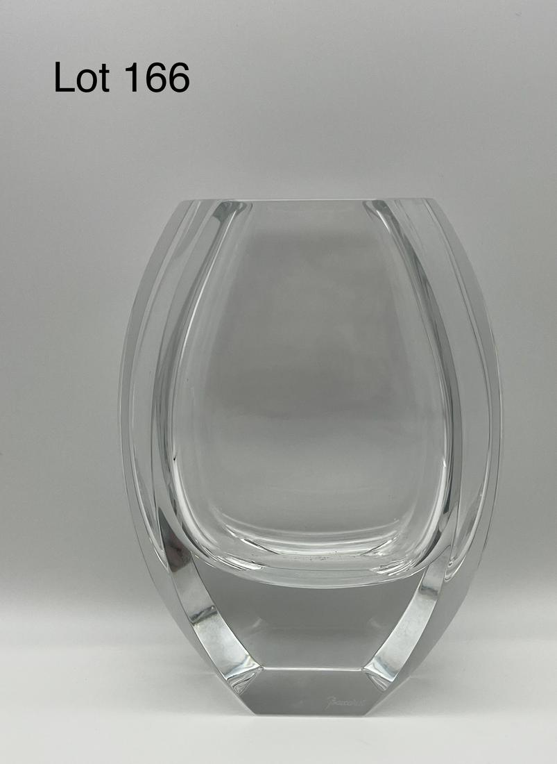 Baccarat Crystal Vase: Crystal glass vase by Baccarat in oval shape. Makers mark at base, measures 8" tall. *note - minor scratches noted