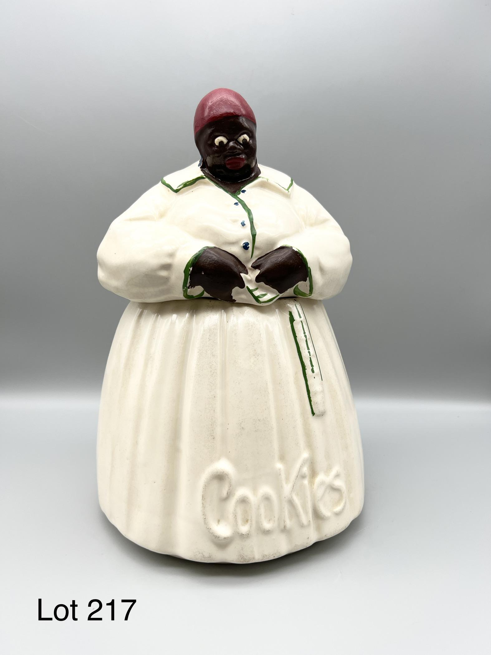 Mid Century McCoy Black Americana "Mammy" Cookie Jar: Vintage mid century "Mammy" figural cookie jar by McCoy. Stands 11" tall. Makers mark on the bottom. *notes- some minor paint loss