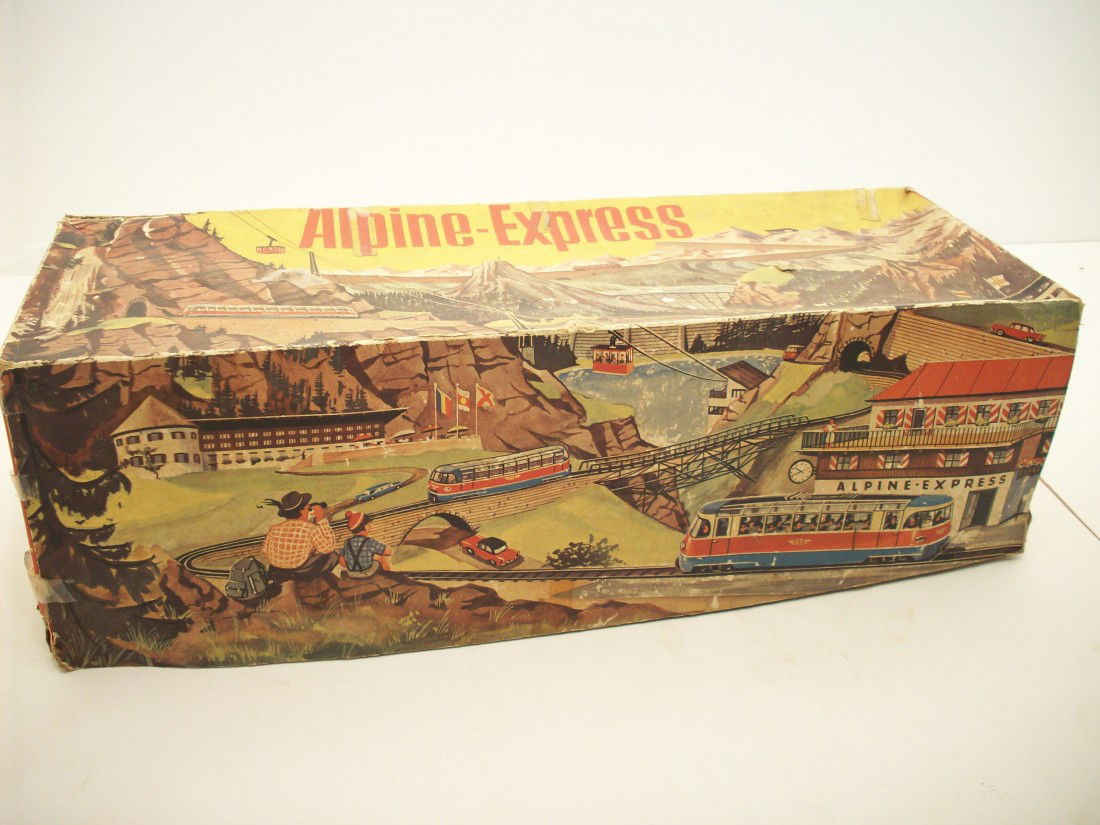 Marke Technofix Tin Litho Wind Up Toy 'Alpine Ex...: 32" long 6" wide X 6" tall, Marke Technofix Tin Litho Wind Up Toy 'Alpine Express'. Western German made Tin Litho Wind Up Toy model 300. Includes all tin track, two wind up cars, two keys and the orig