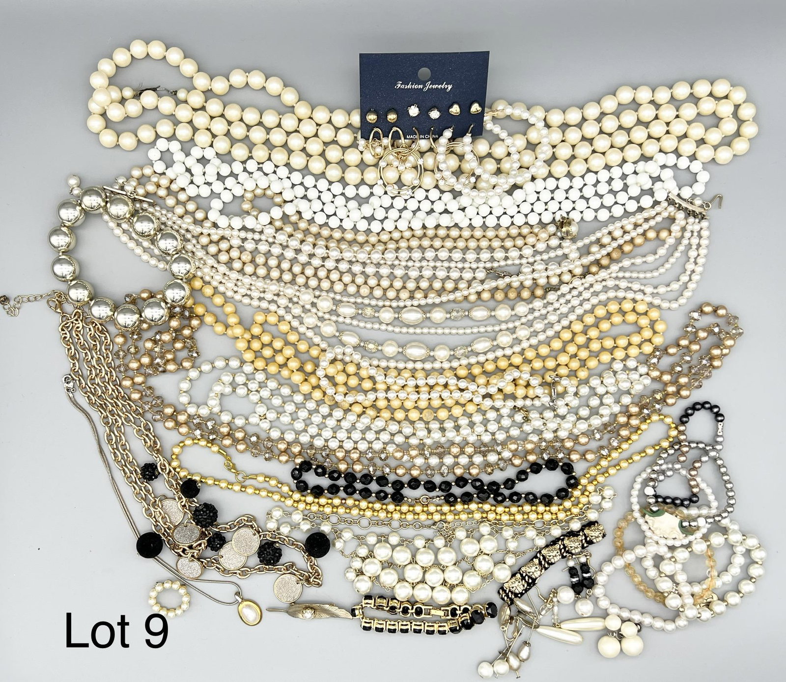 Collection of Faux Pearl and Beaded Costume Jewelry: A stunning lot of faux pearl and beaded jewelry including a wide variety of necklaces, bracelets, earrings and more.