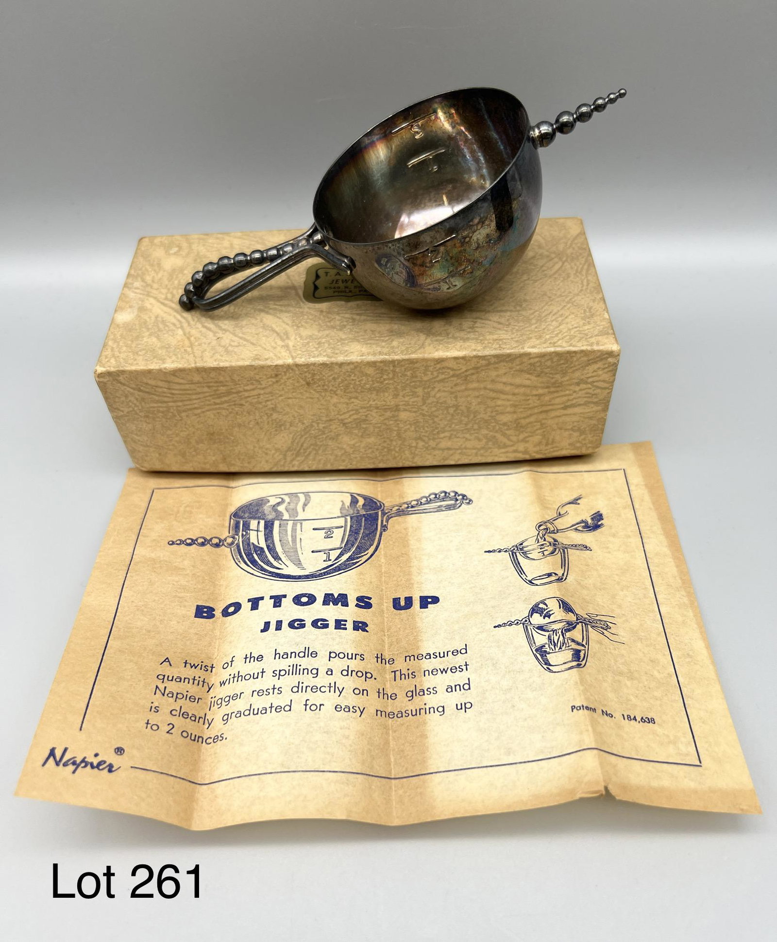 Vintage Silver Plate Jigger: A vintage silver plate "bottoms up jigger" by Napier. *notes- patina