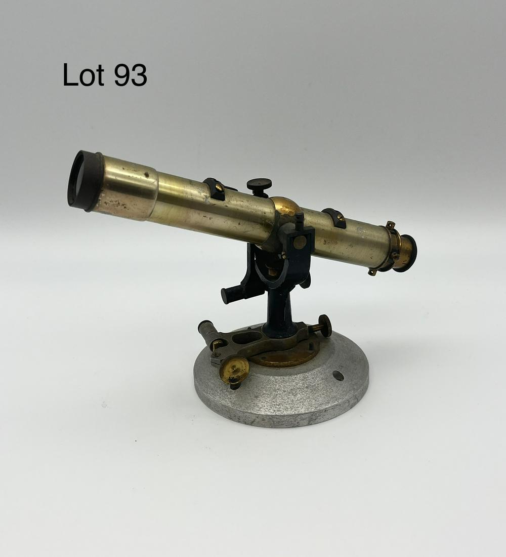 Antique Miniature Telescope: Antique miniature brass telescope on mount, faintly marked what could be "BUE" on frame. Moves up and down, measures 6 1/2" long.