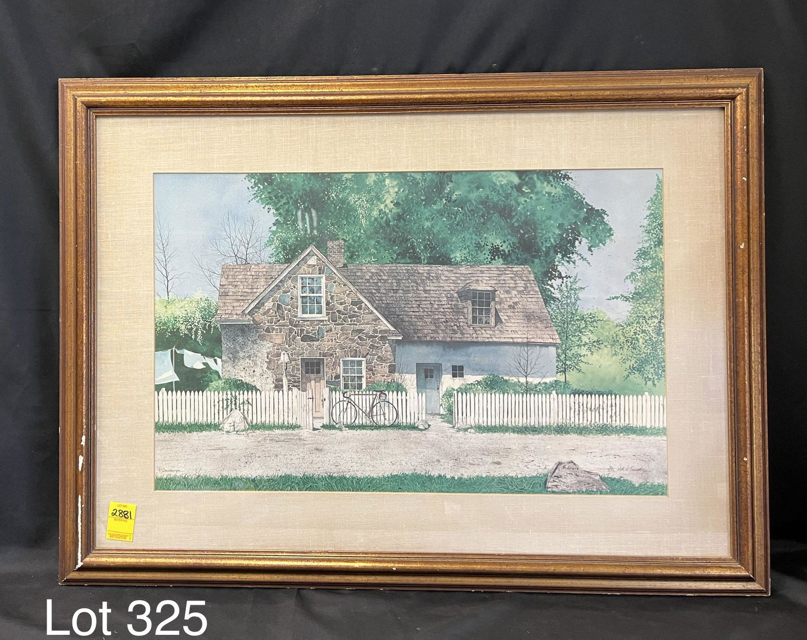 Signed Limited Edition Peter Sculthorpe Lithograph: A signed limited edition (42/250) lithograph by Peter Sculthorpe. This artist is from Chester County, PA and is known for rural landscape scenes. This print depicts a cottage with a bicycle leaning ag