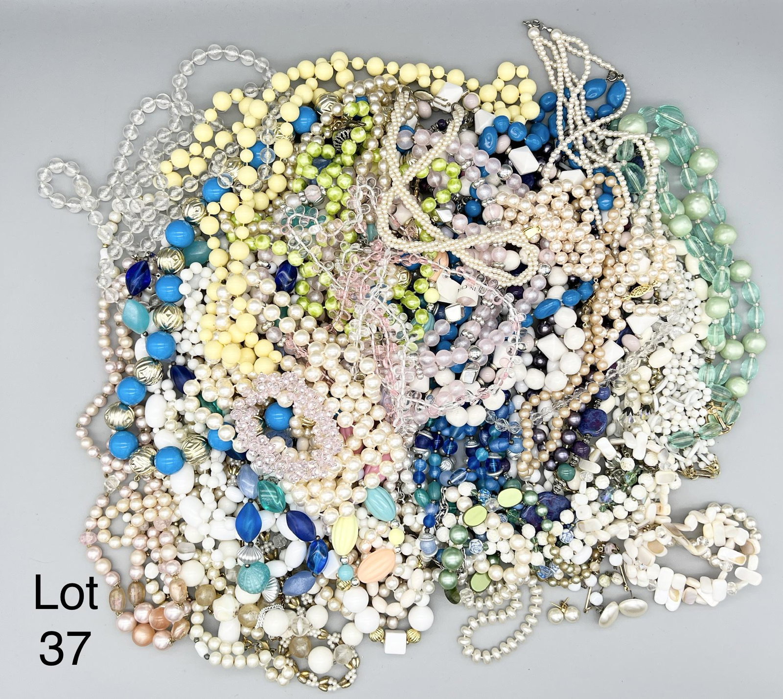 Group of Beaded Costume Necklaces: A great selection of beaded necklaces in a variety of colors. Also includes a few bracelets and earrings that pair well together.