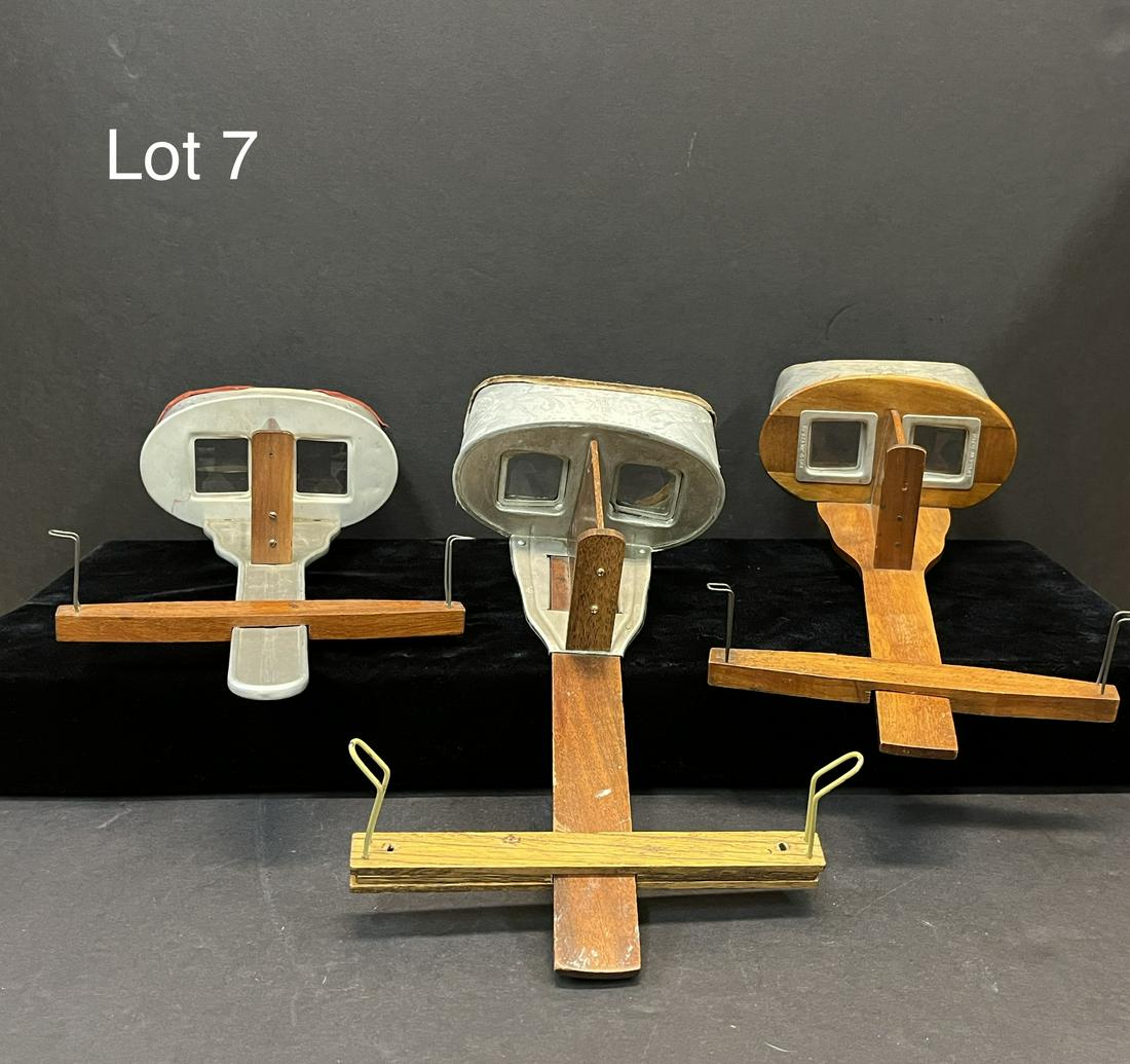 Trio of Turn of the Century Stereoscopes: Trio of turn of the century stereoscopes, two from H.C White and one from Underwood & Underwood. The H.C. White stereoscopes come in different models, with one in wood and the other in tin, the latter