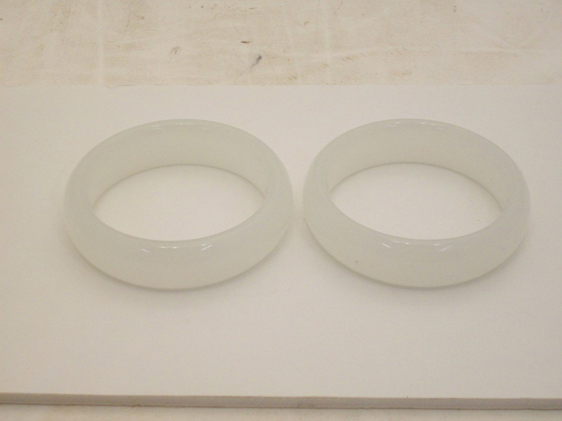 Pair of White Jade Bangles: China. 3" X 3/4", White jade bangles in excellent condition
