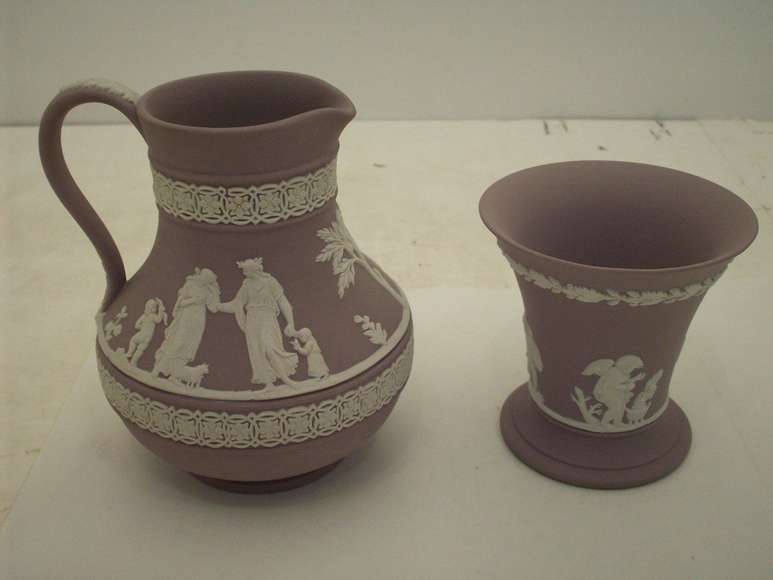 Wedgwood Jasperware Lot #4: Two piece lot. 3 1/2" vase and 5" pitcher. Both are cream on lavender. Both are marked and in excellent condition