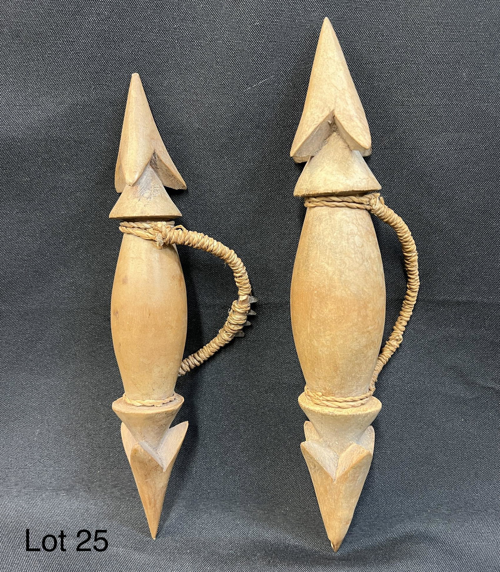 Hand Held "Fighting Spikes": Pair of hand held fighting spikes. Pointed and barbed with fiber spikes. An unusual South Seas weapon. Shipping dimensions 11" L x 1 1/2" H x 6" W.