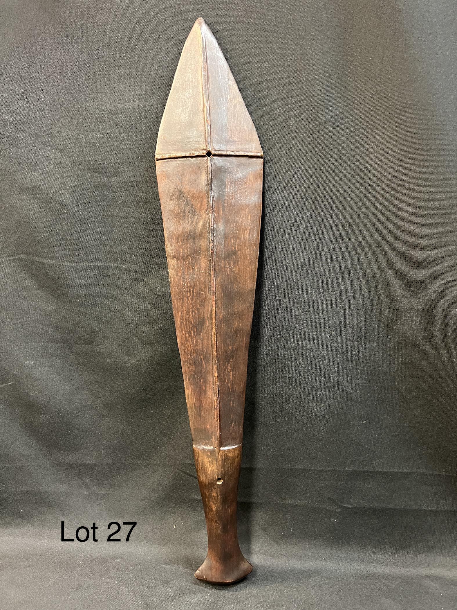South Seas Islands Wooden War Club: Diamond shaped, knife edged wooden war club from the South Seas Island. Shipping dimensions are 27" L x 5" W x 1" H.