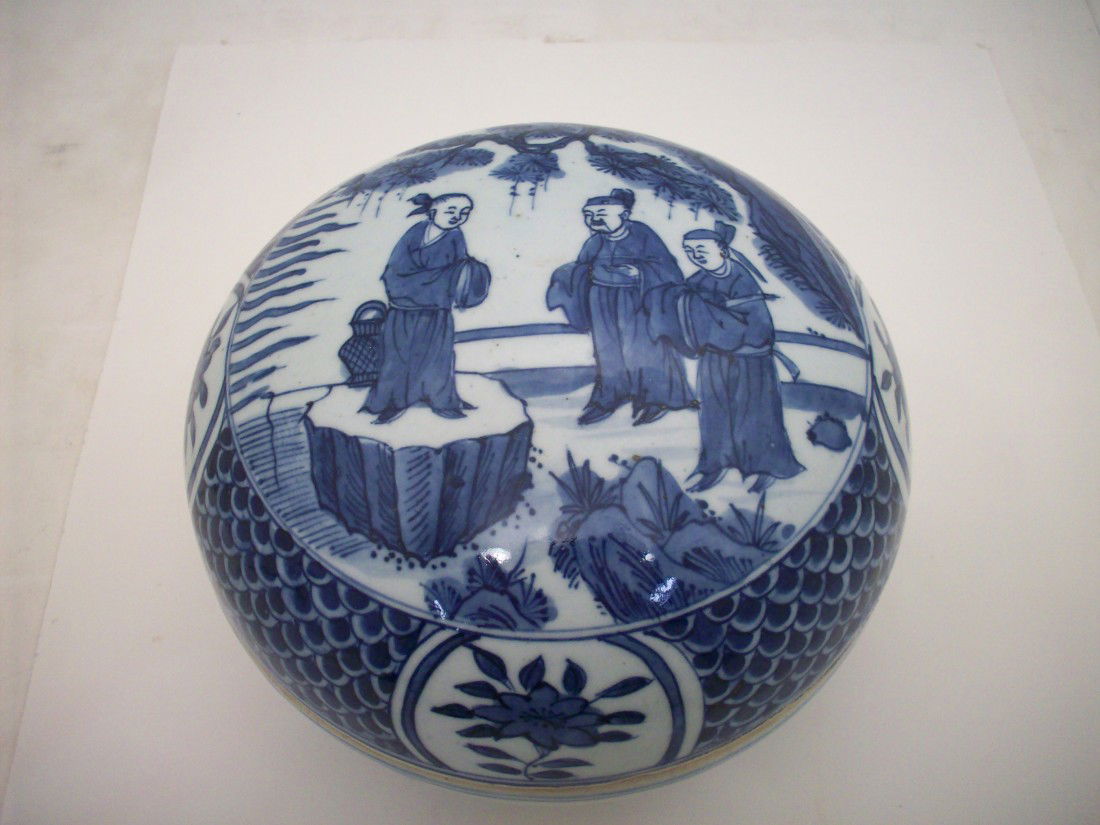 Antique Blue and White Porcelain Round Candy Box: 5" X 7 5/8" diameter, China round lidded "candybox", base has floral design, lid depicts a child on a stand and two adults with four section of fish scale patterned decoration and four cartouches of a