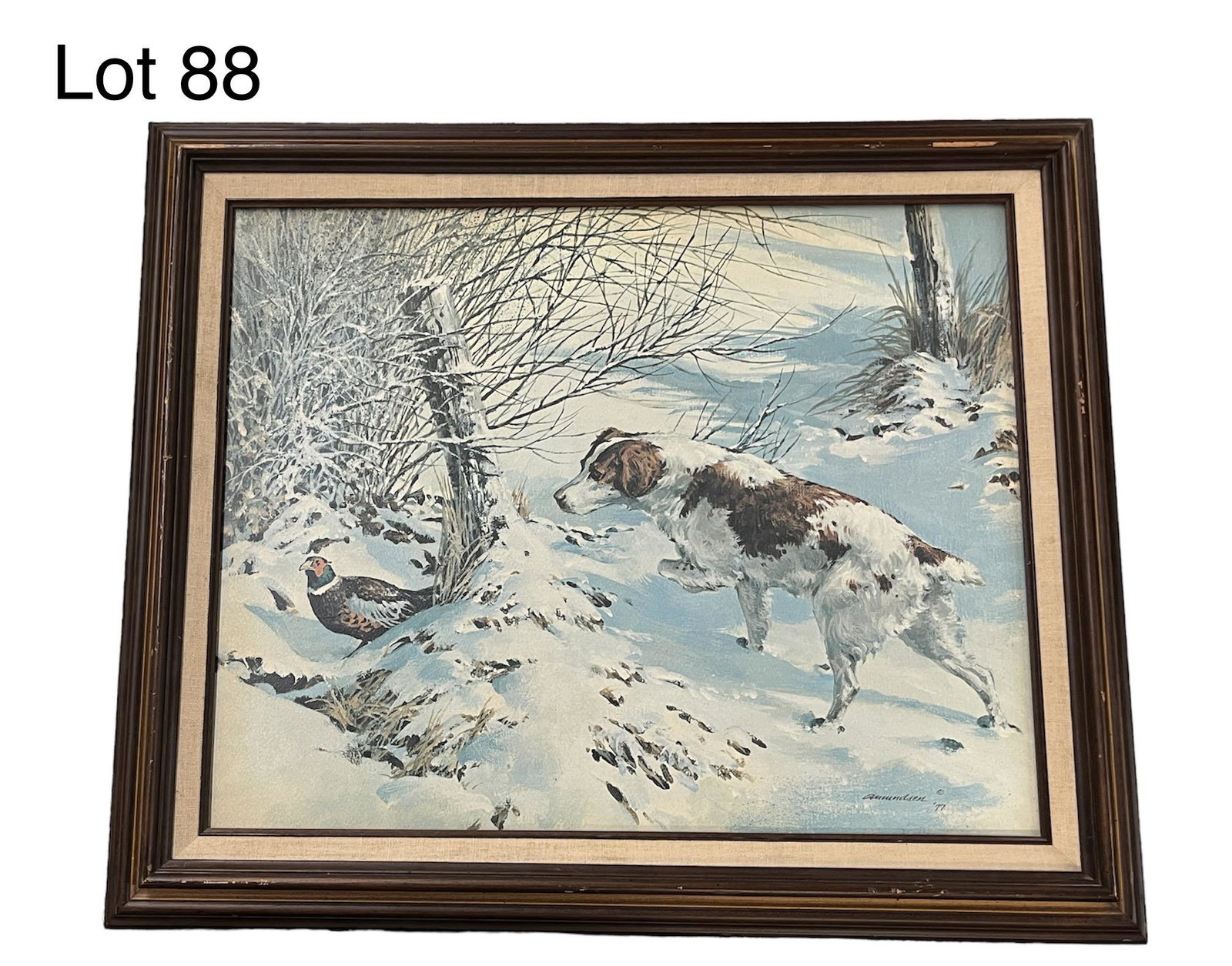 Signed Watercolor on Paper of Hunting Dog: A watercolor on paper of a hunting scene, showing a Brittany stalking a pheasant in the snow. Piece signed and dated "Amundsen '77" in the bottom right corner. Measures 24 1/4" x 20 1/2", 19 1/2" x 15
