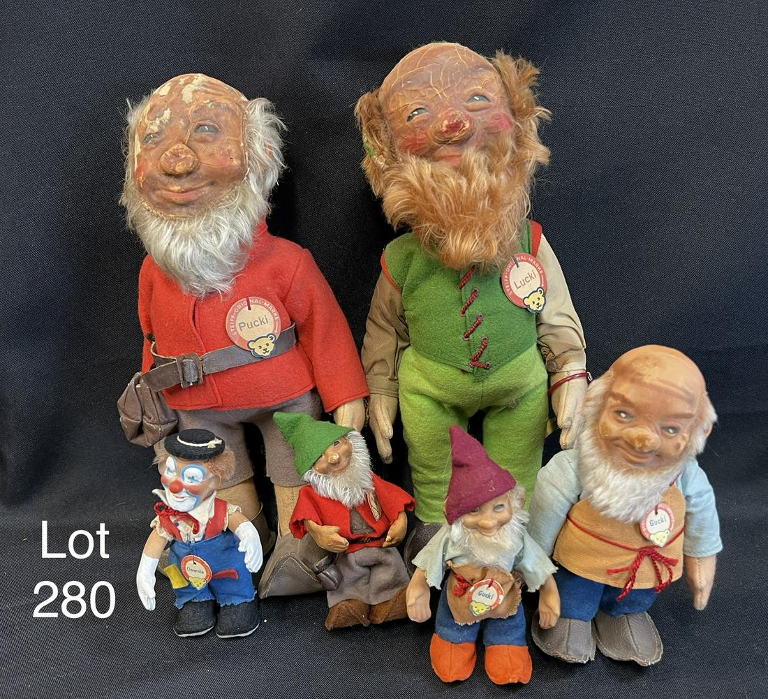 Collection of Mid Century Steiff Gnome Dolls: Group of 1960s Steiff gnome dolls. Includes 12" Pucki and Lucki, 7" Gucki, 5" Gucki, 5" Pucki and a 5" Clownie. Made in Germany. *notes- cracking on faces, wear from age.
