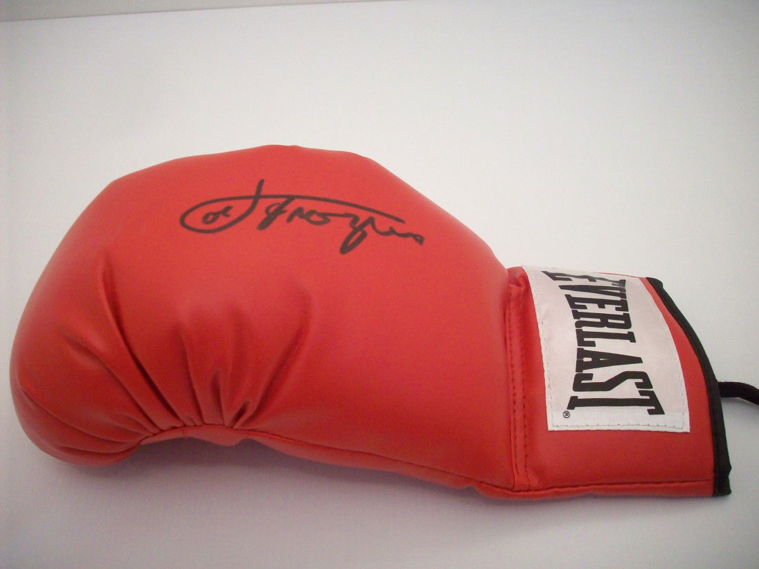 Joe Frazier Autographed Boxing Glove: Everlast left hand boxing glove, excellent condition with JSA certification