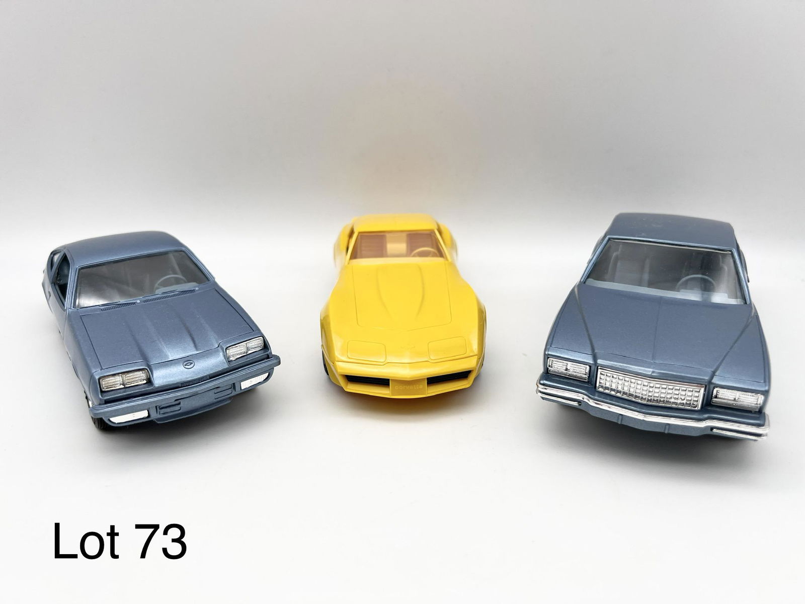 Trio of AMT-Ertl 1980 Model Cars: Lot of 3 AMT-Ertl 1980 promotional model cars in original boxes. Includes a 1980 light blue Monza, a 1980 yellow Corvette and a 1980 blue Monte Carlo.