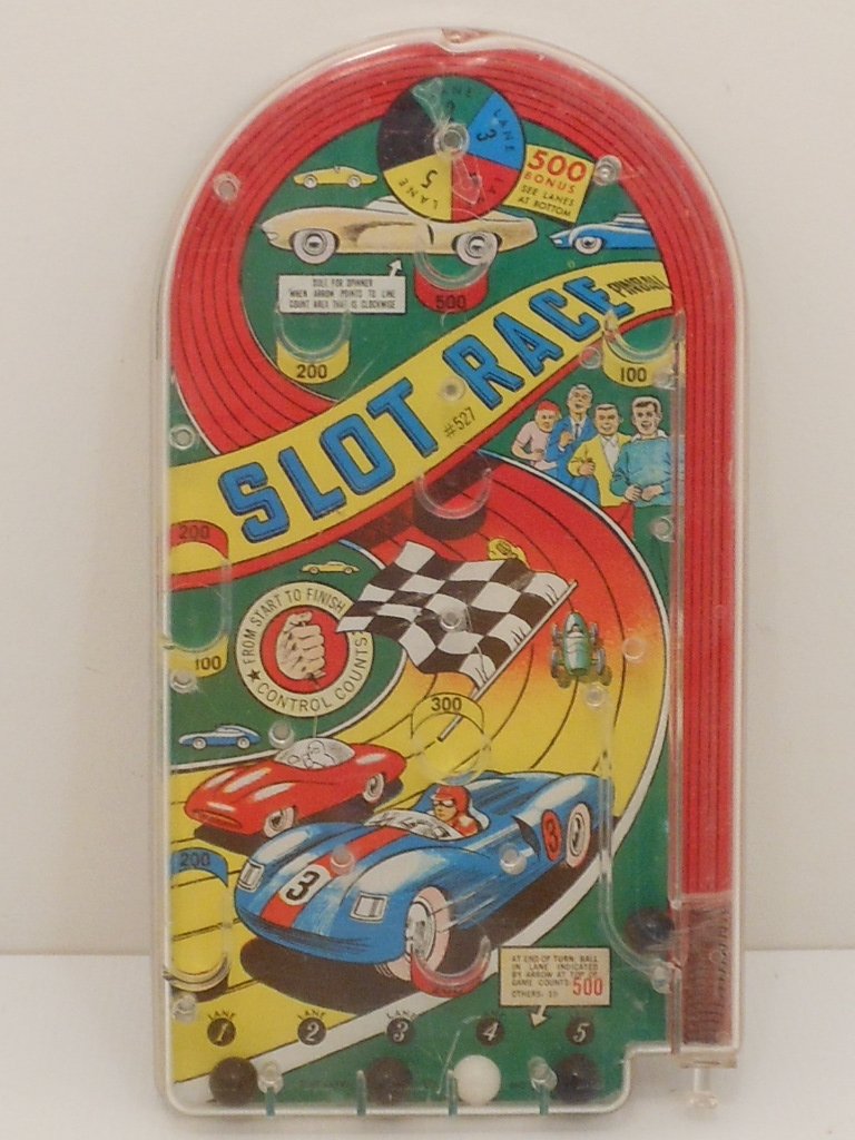 Slot Race Handheld Pinball Game: Vintage 1966, Steven Mfg. Co., 11" handheld game , uses black and a white marble (cracked in half), used condition, age appropriate wear