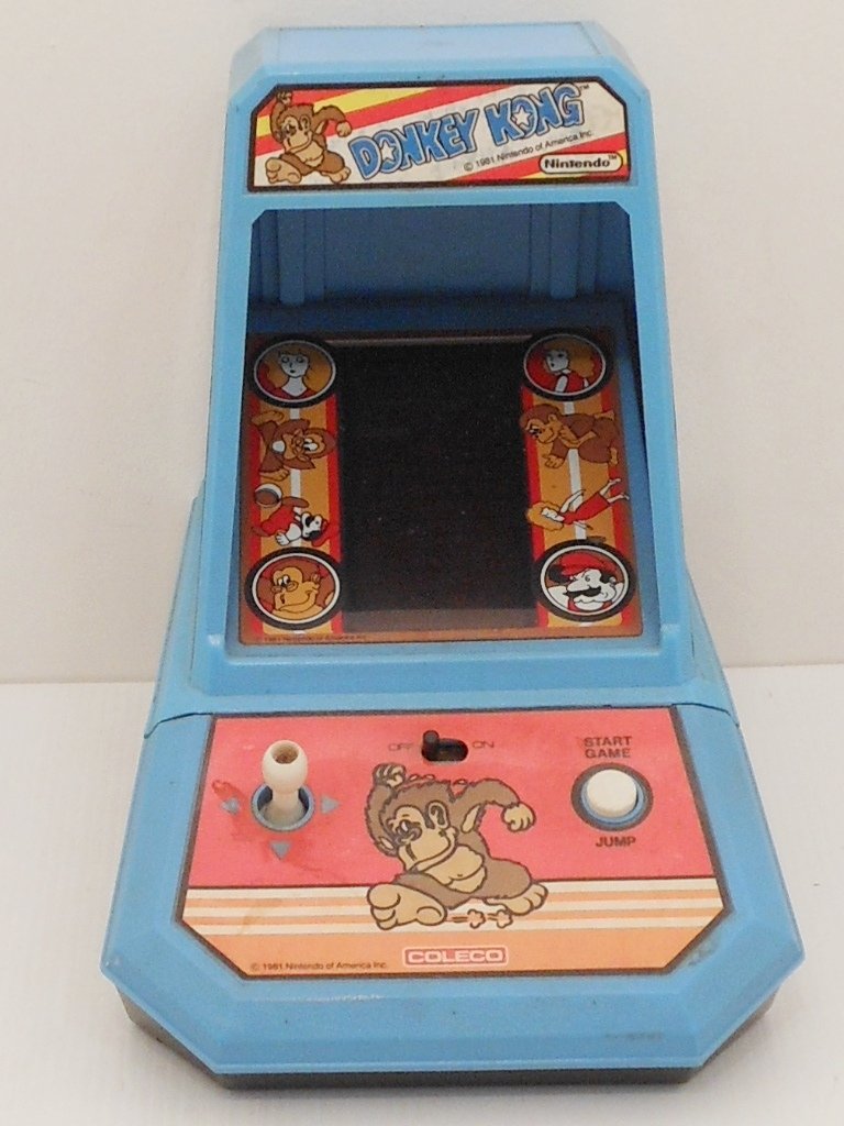 Coleco Donkey Kong Table Top Arcade Game: Vintage 1981 Donkey Kong Table Top Game, tested, in working condition but moving to left is not