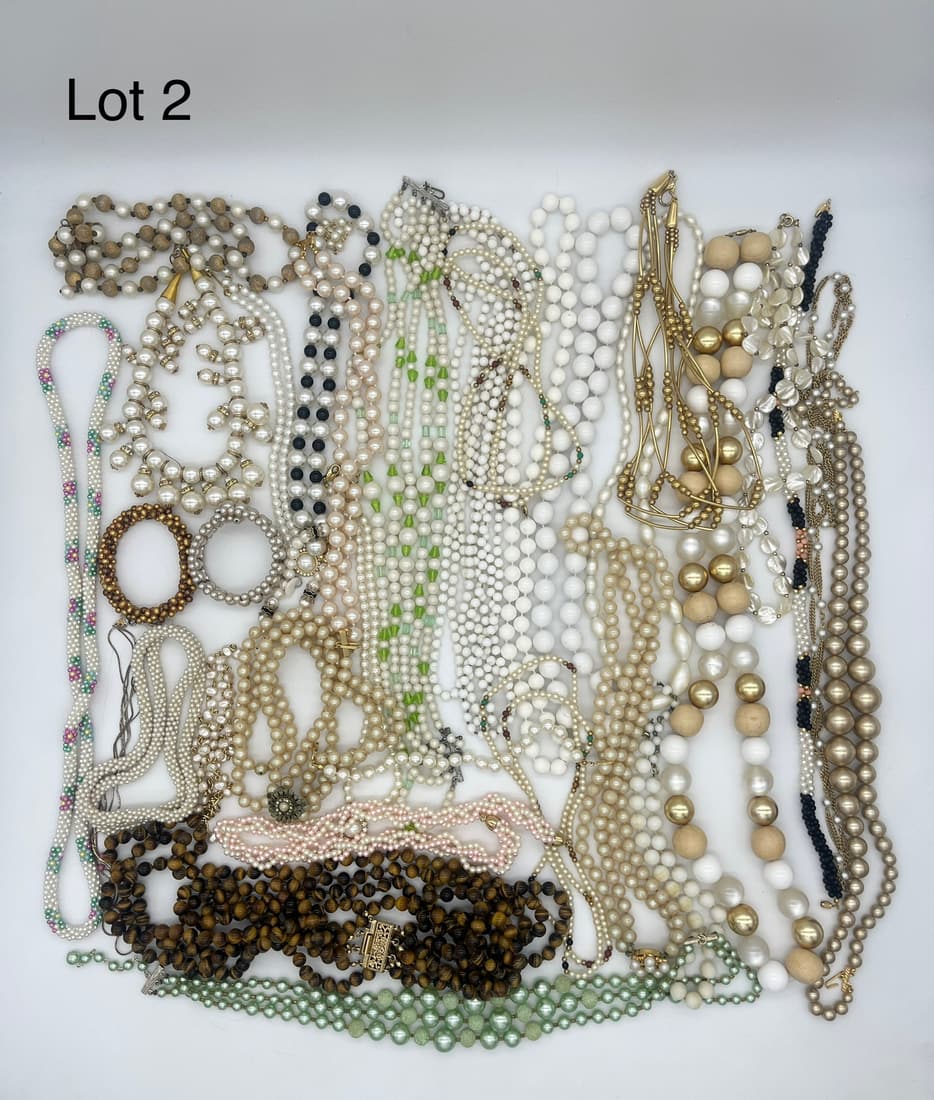 Lot of Beaded Costume Jewelry in Light Tones: A lot of beaded costume necklaces, bracelets, and other pieces in bright tones.