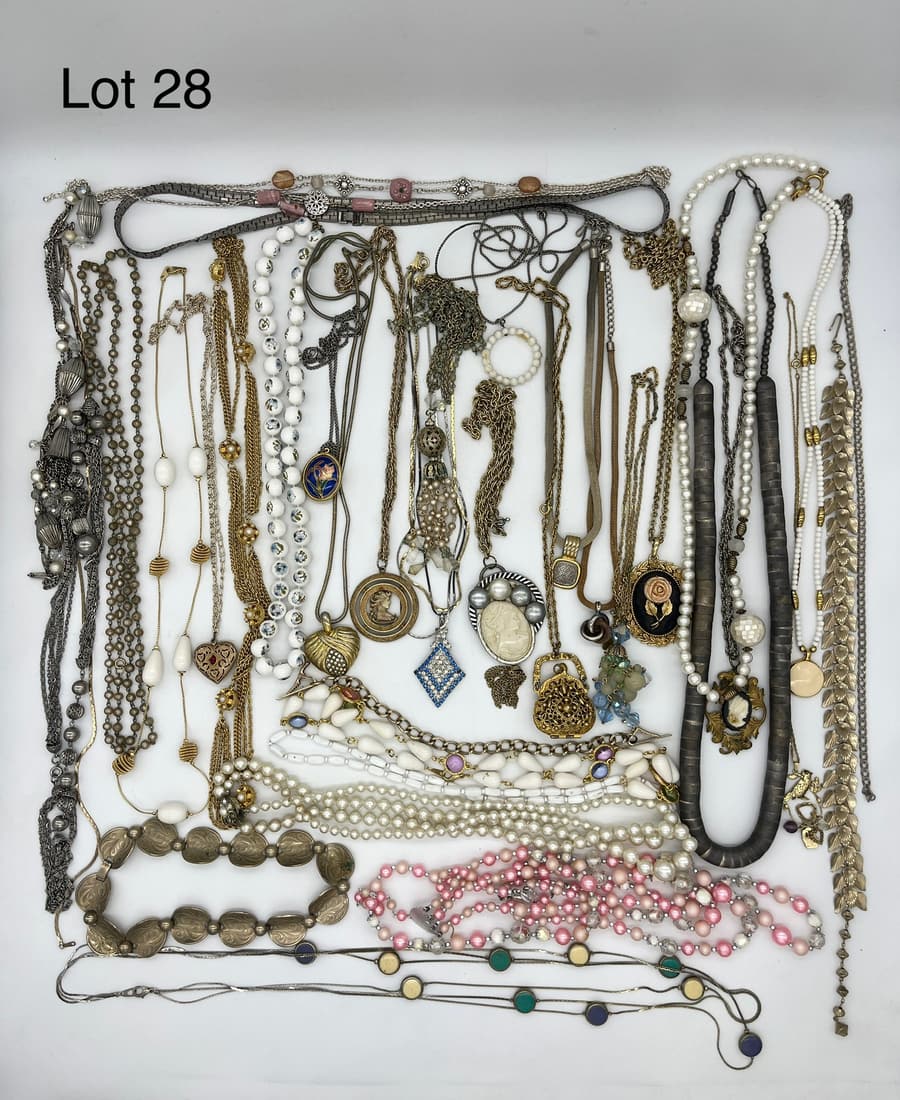 Selection of Vintage Costume Jewelry Necklaces: A fine selection of vintage costume jewelry necklaces, both signed and unsigned, with unique designs including cameos, mixed metals, and enamel. Designers include Princess House, Ellen Klein, and more