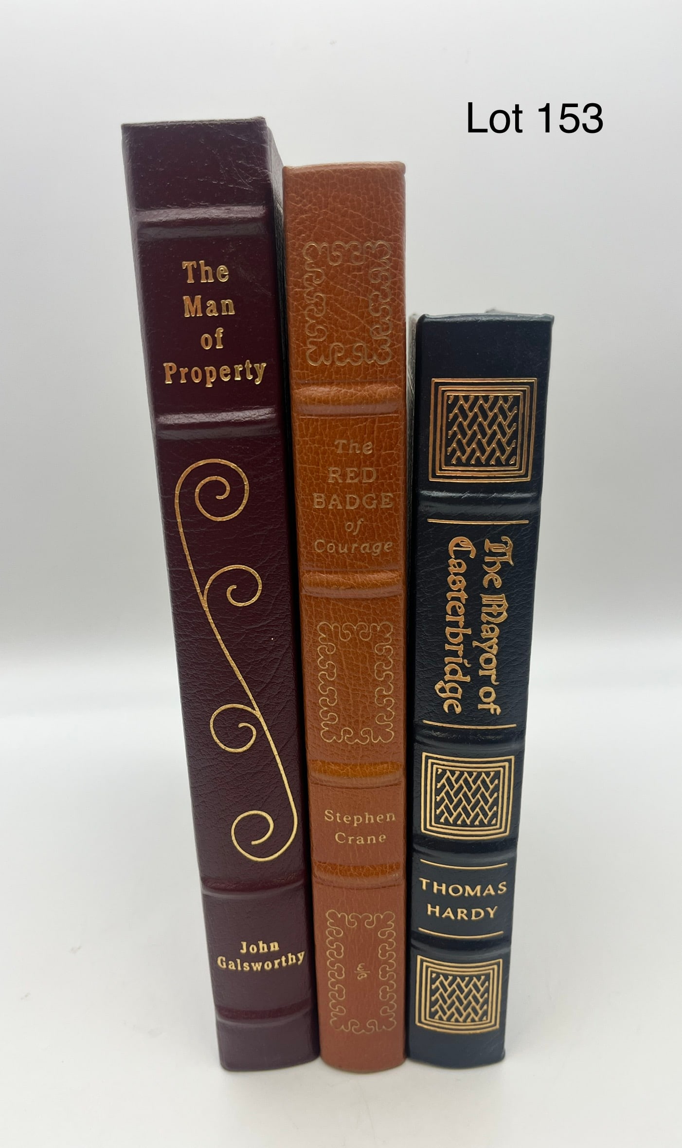 Trio of Easton Press Turn of the Century Novels: A trio of Easton Press novels written during the late 19th/early 20th centuries. Lot includes: "The Man of Property" by John Galsworthy, "The Red Badge of Courage" by Stephen Crane, and "The Mayor of 