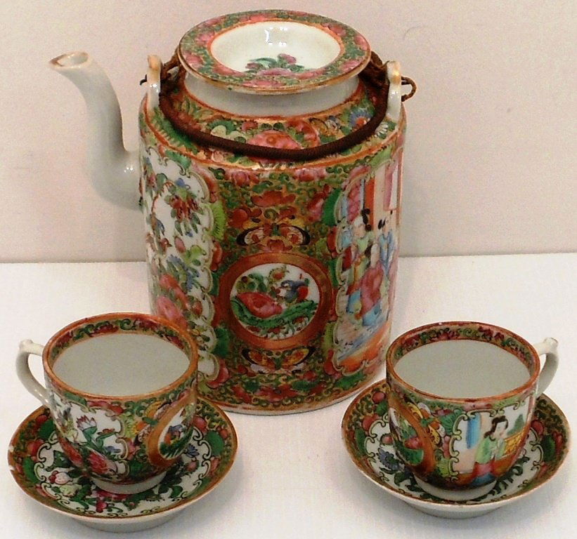 19th Century Famille Rose Tea Set With Saucepans: China, 6" X 6" teapot with cord covered wire handles, 2 1/4" tea cups with handles, 3 5/8" saucepans, all in matching Famille rose, unmarked, great condition with minor paint loss and one saucepan has