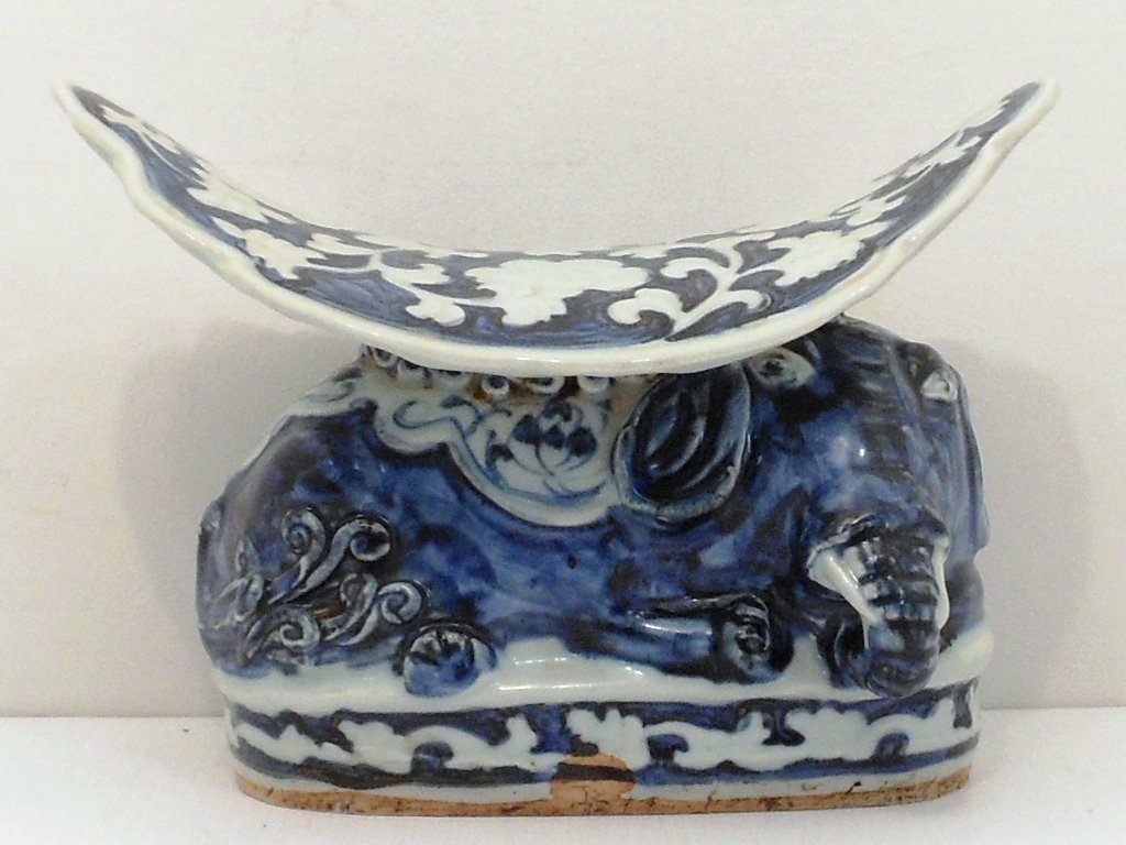 19th Century Blue and White Porcelain Pillow: China, 6 1/4" tall X 8 3/4" wide X 6" deep, porcelain 'pillow' with curved top and a resting elephant base, unmarked, great condition with a small old crack on the back of the top