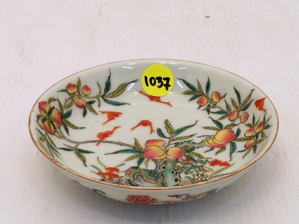 18th Century Famille Rose Plate #1: China, 1 1/8" tall X 4 7/8" diameter, porcelain plate decorated with a peach tree, peaches, and iron red bats above waves, floral designs on exterior, marked, excellent condition