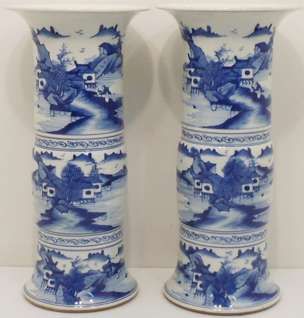 19th Century Pair of Blue and White Beaker Vases: China, 15 18/" tall X 7 1/4" wide, matching porcelain vases, flaring upper section, the central section and the flaring lower section are all decorated with seascape scenes, sections are divided with 