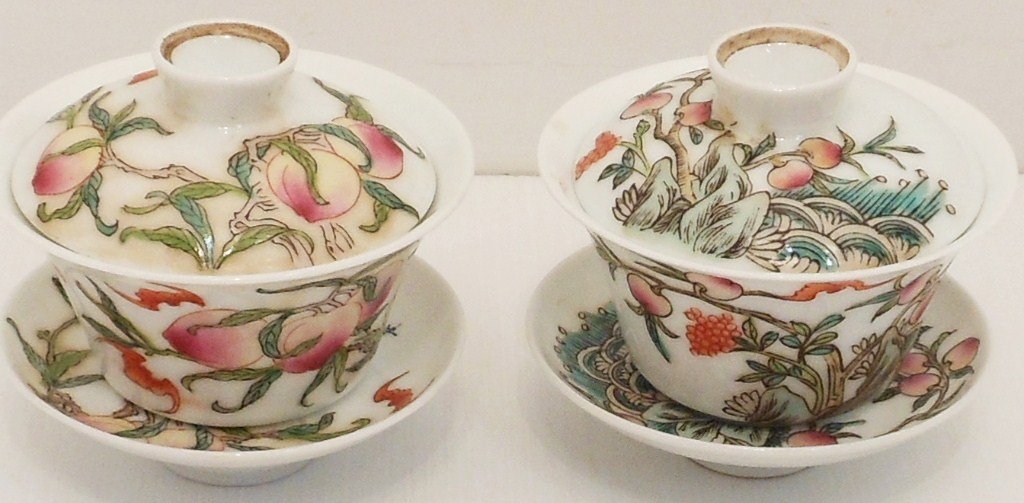Pair of 19th Century Famille Rose Tea Cups: China, Cup- 2 1/8" tall, Saucepan- 3 1/2", Lid- 3", porcelain decorated with peaches, bats, and flowers, each has characters, marked, great condition