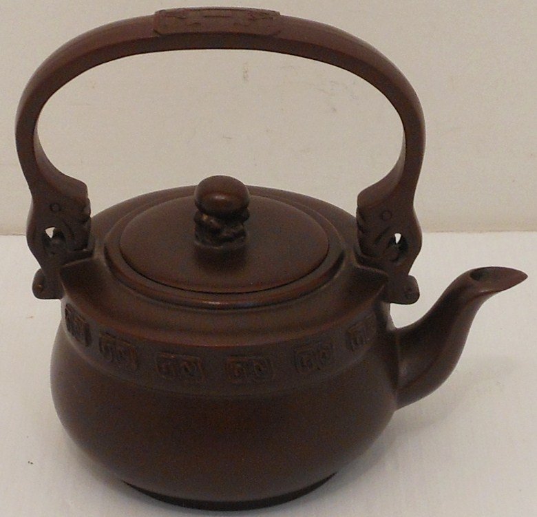 Antique Yixing Zisha Pottery Tea Pot: China, 5 3/4" tall x 6" wide, Zisha tea pot with lid and handle, decorated with patterned designs , marked, excellent condition