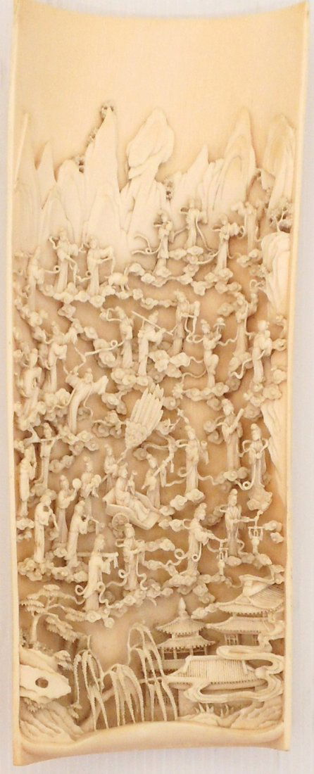 Large Ivory Carving on Interior of a Tusk: China, 10 3/4" tall X 4 1/4" wide X 1 5/8" deep, meticulously detailed hand carved interior of an Ivory tusk, village scene with more than thirty women engaged in various actives floating on stylized