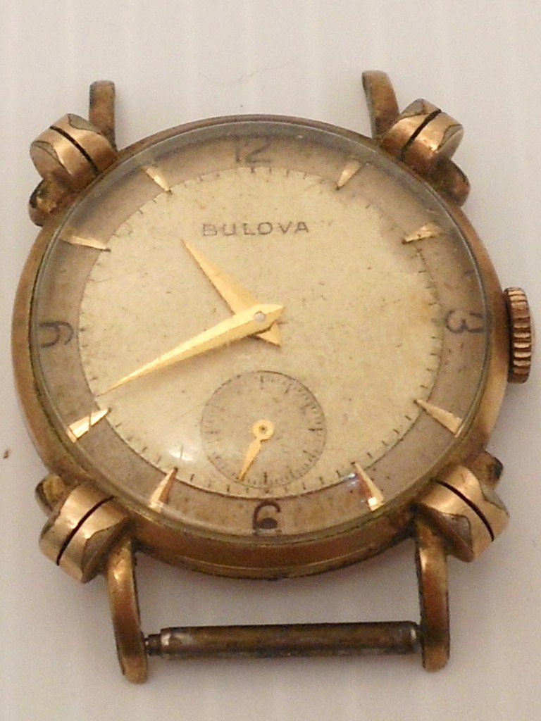 Bulova 10BT L2 17 Jewel Mens Watch: Bulova 10BT L2 (1952) 17 Jewel Men's Wrist Watch, 10K Rolled Gold Plate case, no band, used working condition with scratches on crystal