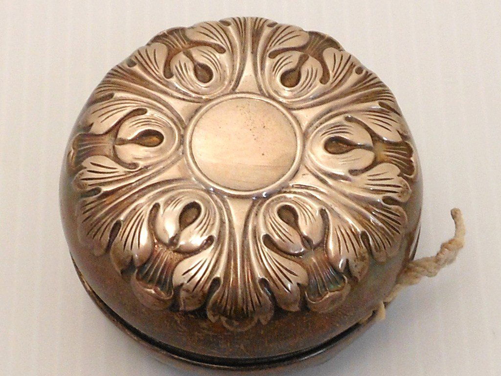 Gorham Sterling Yo-Yo: 1 3/8" X 2 1/4" diameter, Vintage Gorham sterling yo-yo with chaised floral designs, marked: GORHAM STERLING COVER 30 STEEL BODY, great condition with patina