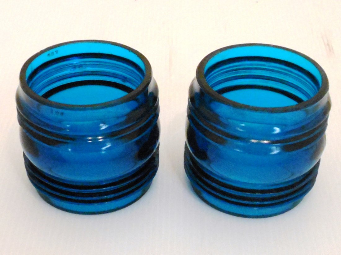 Lot of NOS Fresnel Railroad Lantern Lamp Globes #2: Lot of two. Two blue globes. 3 1/4" tall and wide, made by Embury, dusty new old stock, excellent condition.