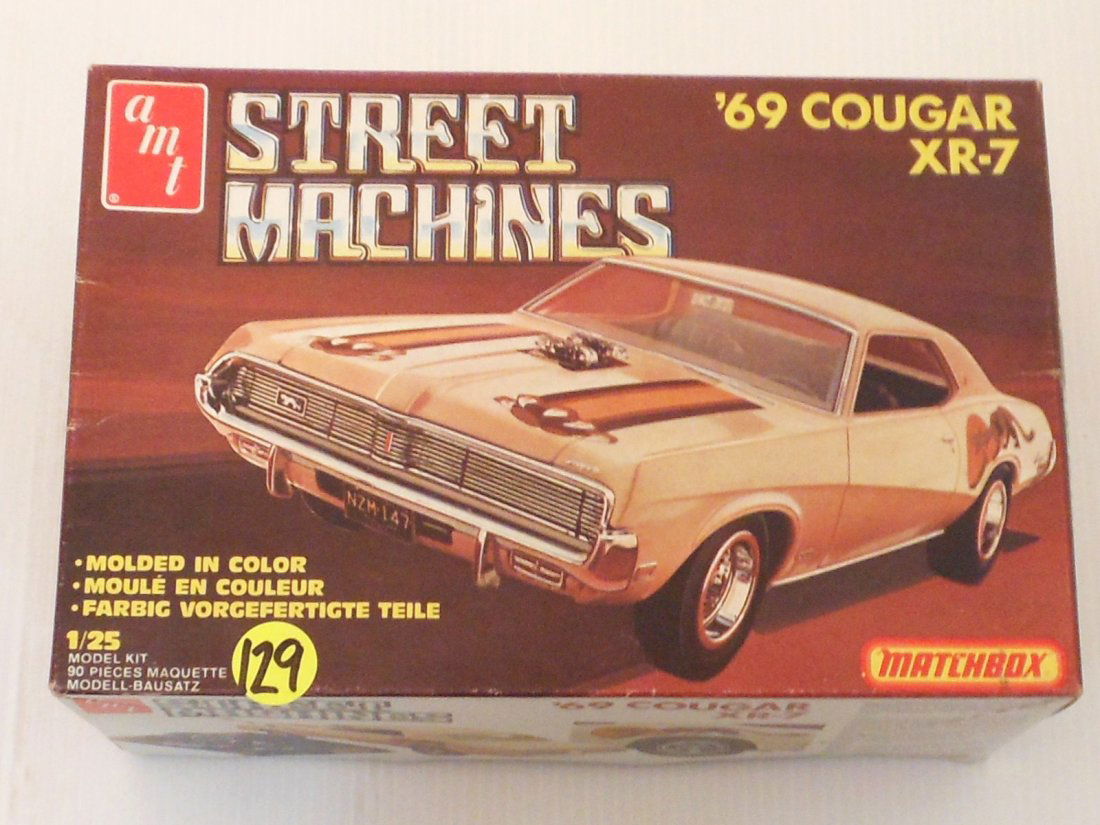 1/25 Scale Street Machines '69 Cougar XR-7 Model: Unbuilt plastic model kit of a '69 Cougar XR-7 by amt Matchbox series, kit #PK-4169, with instructions and decals, looks to be complete, box in great condition