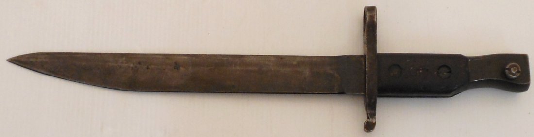 Canada M1910 Ross Rifle Bayonet: 14 5/8" total 10 1/8" blade and 4 1/2" hilt. Used on the Canadian WWI Ross Straight Pull Rifle. Nicely marked on the handle wood and metal. Good condition. May have residual from cleaning.