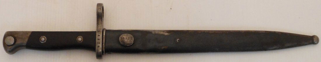 Bayonet for 1894 Brazilian Rifle: 14 1/2" total 10" blade and 4 1/2" hilt. German made knife bayonet. Marked Weyersberg over Kirschbaum & Co. over Solingen, crosspiece stamped: K9376. 10 3/4" metal scabbard marked: D6913. both in grea
