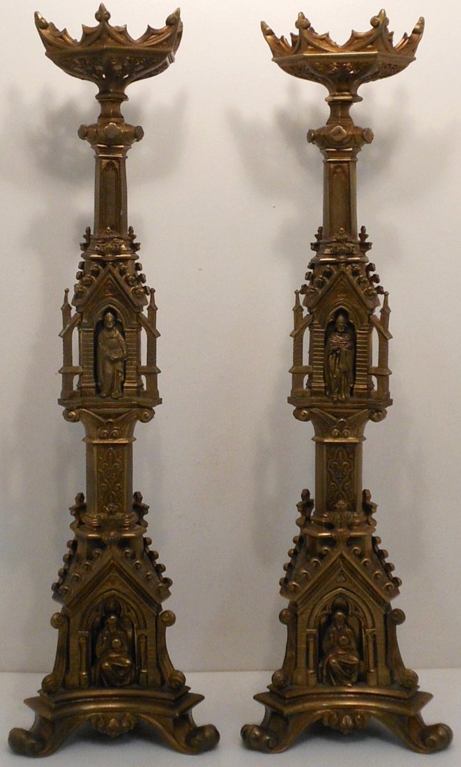 Pair of 20th C. Bronze Italian Gothic Altar Sticks: 29 1/4" tall X 8 1/2" wide, large cast bronze early 20th century Italian Gothic Altar Sticks, with a three-sided architectural facade of arches heavily decorated with Scholars, remnants of a lamp conv