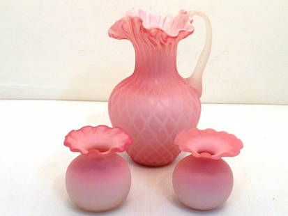 Lot Handblown Pink Ruffled Frosted Glass: Lot of three. Pair of 3 1/2" pink to white frosted vases with ruffled rims, slight size and detail differences. 9" Pink with white bands frosted pitcher with a ruffled rim, applied frosted white