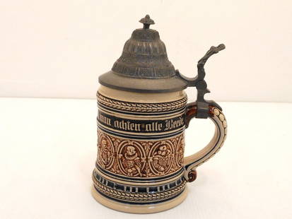 German Beer Stein with Pewter Lid: 5" porcelain stein with a hinged pewter lid, German writing, marked on bottom 837, Excellent condition