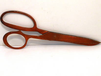 Oversized Dressmaker's Shears for Window Display: 21" long X 7 1/2" wide x 1/2" thick, light metal display/advertising scissors that would have been hung in the front window of a tailor's shop. Finished and painted red on one side. Will not cut as