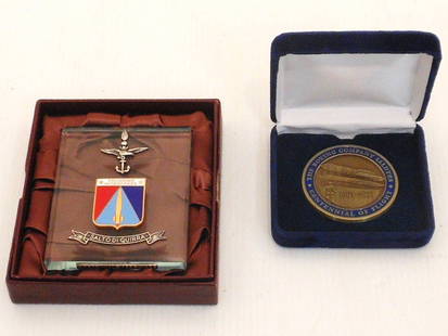 Lot of Commemorative Awards: Lot of Two. Ten year commemorative glass plaque with metal insignias from the Italian Salto di Quirra rocket launching site under the authority of the Italian Air Force. The plaque is marked: