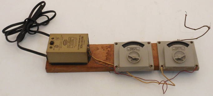 Aurora Model Motoring Motor Pack and Controllers: Mounted on a piece of wood are two controllers and a motor pack model A1-B, looks to be in working order, untested.