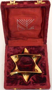 Alef Judaica Brass Star of David: 5" x 5", Brass Star of David Paper Weight, spiral Star of David design, includes a velvet covered box. Excellent condition.