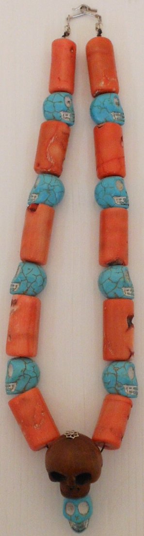 Pink Coral and Blue Turquoise Skull Necklace: 18" chunky Pink Coral and Blue Turquoise Skull Necklace with a Netsuke skull center piece, simple clasp, restrung, Excellent condition.