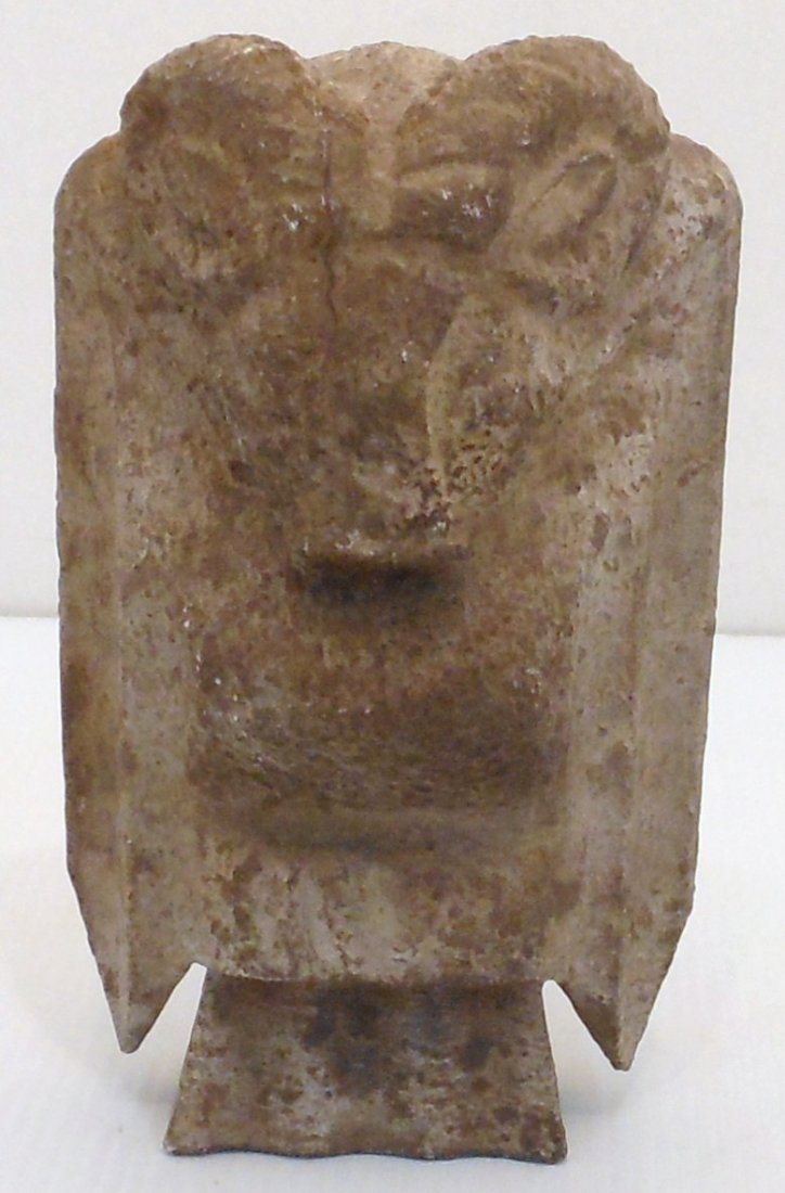 New Zealand Maori Tribe Stone Art: 6 3/4" tall X 4 1/8" wide X 3" deep, hand carved stone what appears to have a rams head with straight pointed arms and feet, great condition.