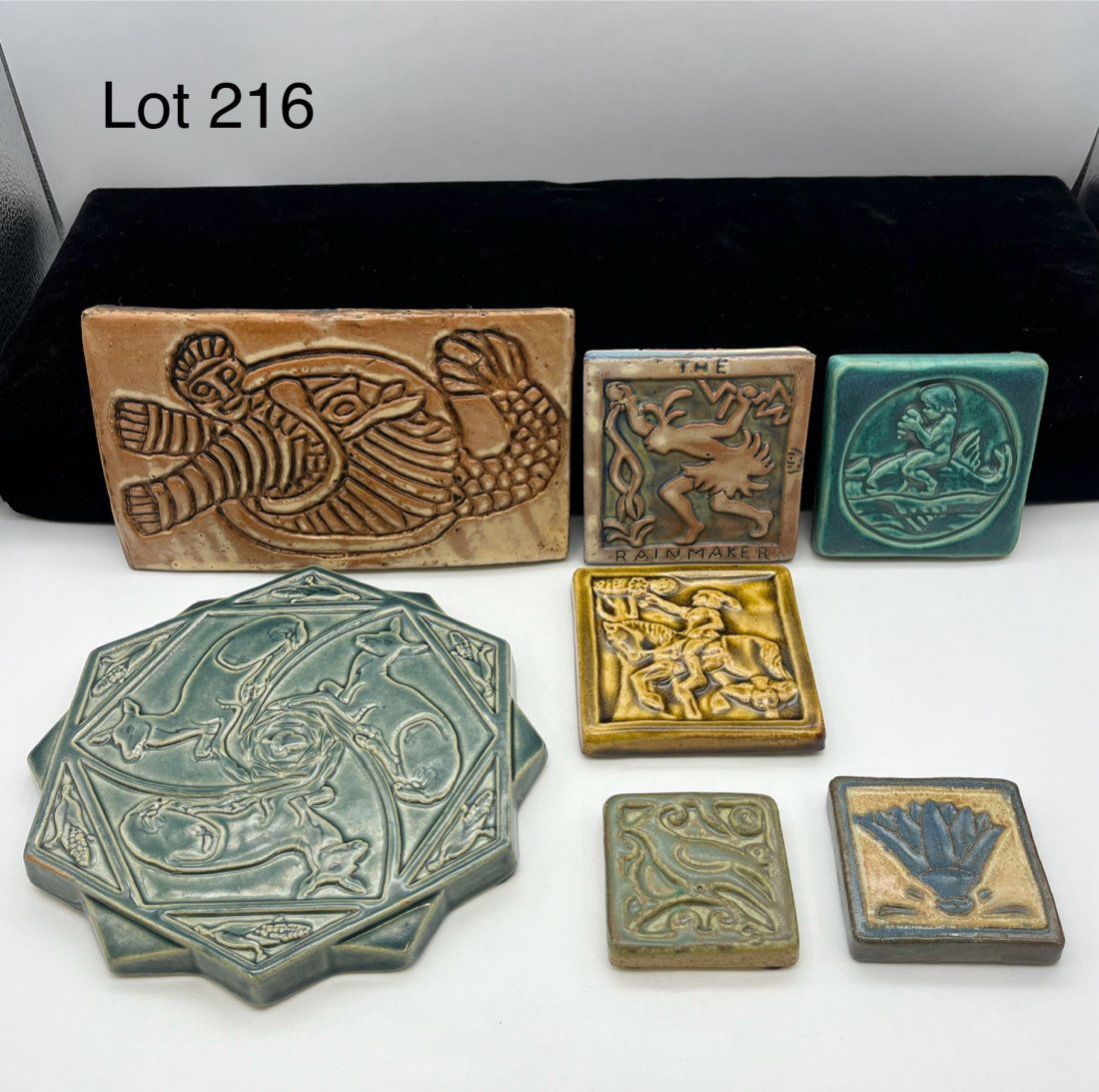 Beautiful Collection of American Pottery Tiles from Pewabic and Moravian Pottery: A beautiful collection of seven American pottery tiles, including five from Pewabic Pottery and two from Moravian Pottery and Tile Works, designed by Henry Mercer. Mercer tiles include "The Rainmaker"