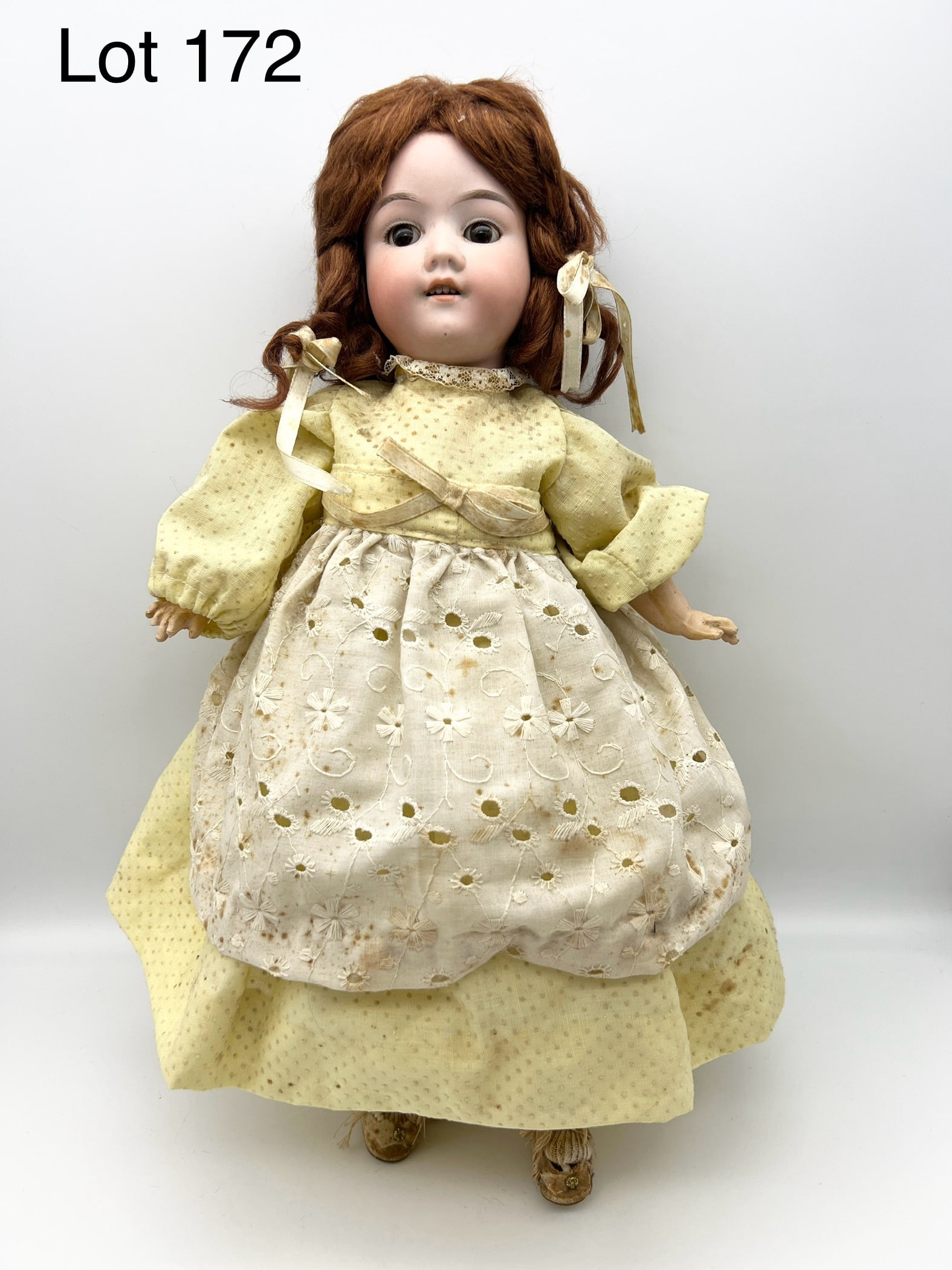 Antique German Armand Marseille "Floradora" 16" Doll: Early 20th century German bisque head "Floradora" doll by Armand Marseille. Back of neck is marked "Made in Germany / Armand Marseille / DRGM 246h / Floradora." This doll has red curly hair, brown sle