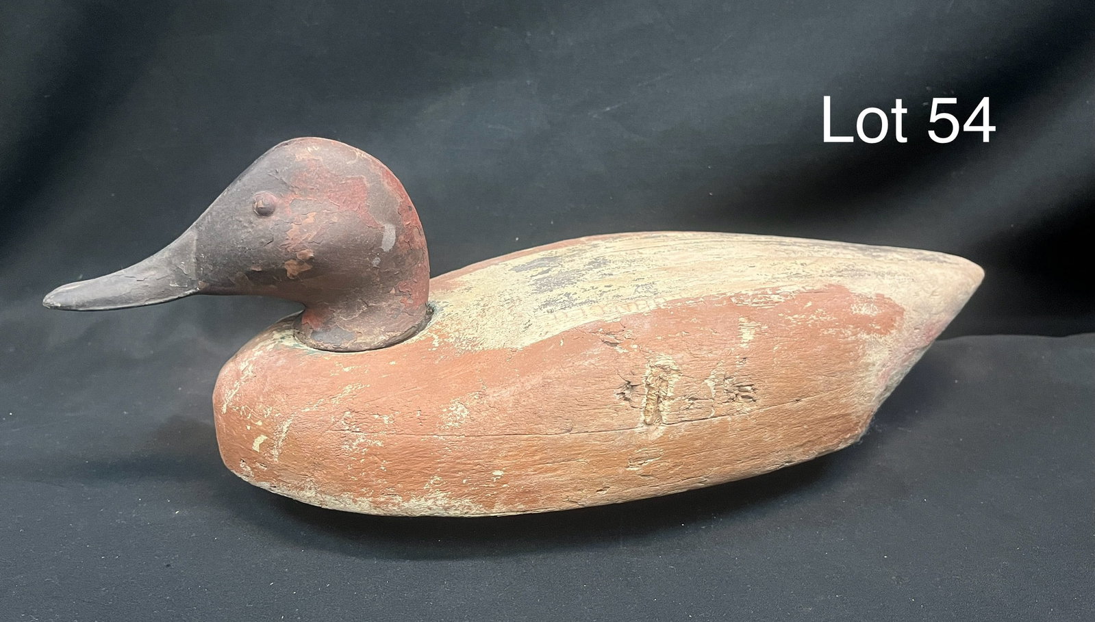 Canvasback Drake Duck Decoy: An early Canvasback drake duck decoy in light wood construction. Wooden eyes, piece is branded "Gun Club" at the top, no makers marks noted. Measures 16" *note - wear with use and age