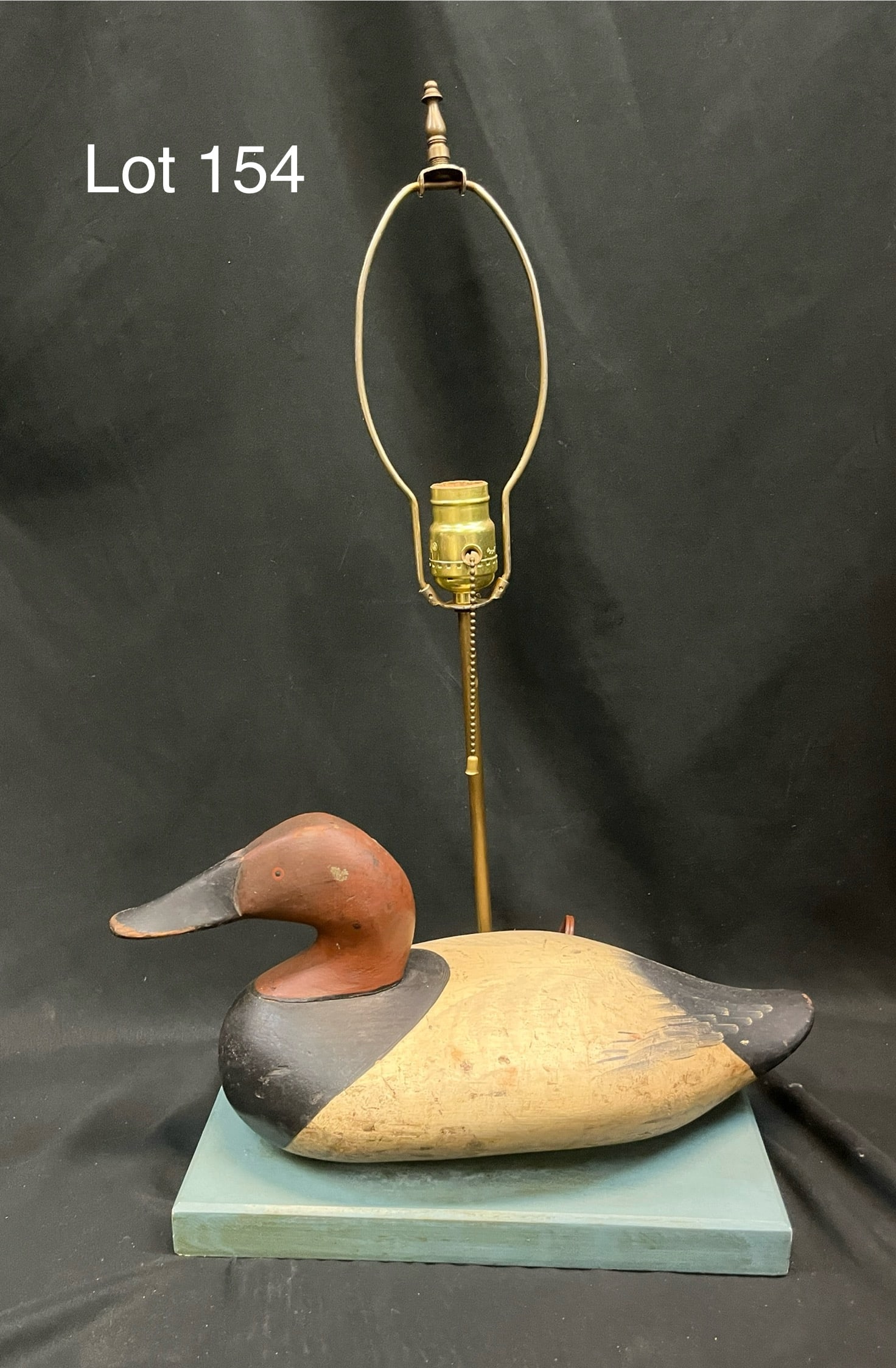 Canvasback Drake Duck Decoy Lamp: A vintage table lamp with attached Canvasback drake duck decoy. No makers marks noted, works well. Decoy measures 15" long, lamp measures 22 1/2" tall.